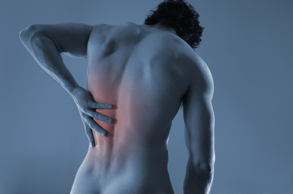 man suffering from a chronic back pain
